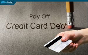 An individual reviewing their finances, focused on strategies to pay off credit card debt fast.