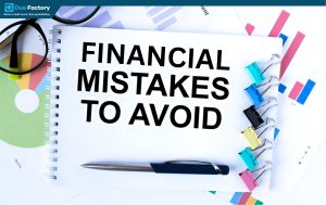 Notebook with "FINANCIAL MISTAKES TO AVOID" text, pen, glasses, and colorful tabs on desk.